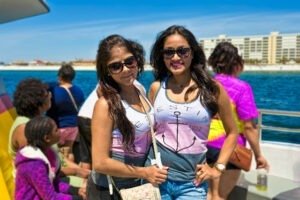 girls on dolphin cruise boat tour in destin florida